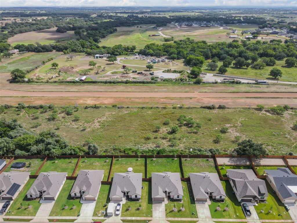 624 Jameson Springtown, TX 76082 - Photo 35 of 40 an aerial view of a city with lots of residential buildings