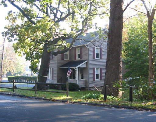 53 Beaver Brook Road Danbury, CT 06810 - Photo 1 of 1 a view of a house with a tree in front of it