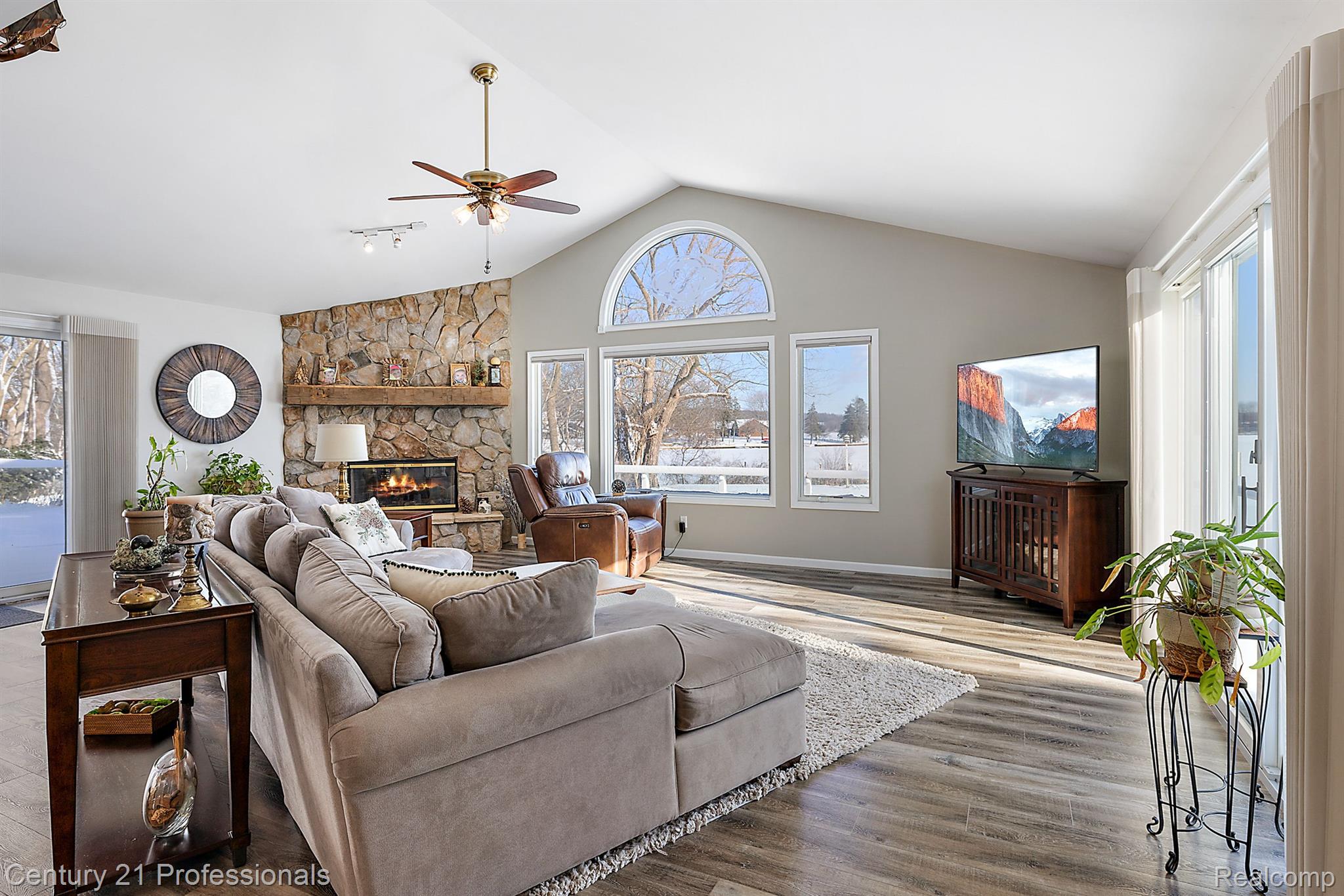 8856 Bridge Lake Road Clarkston, MI 48348 - Photo 22 of 91 Living Room with magnificent views of the lake
