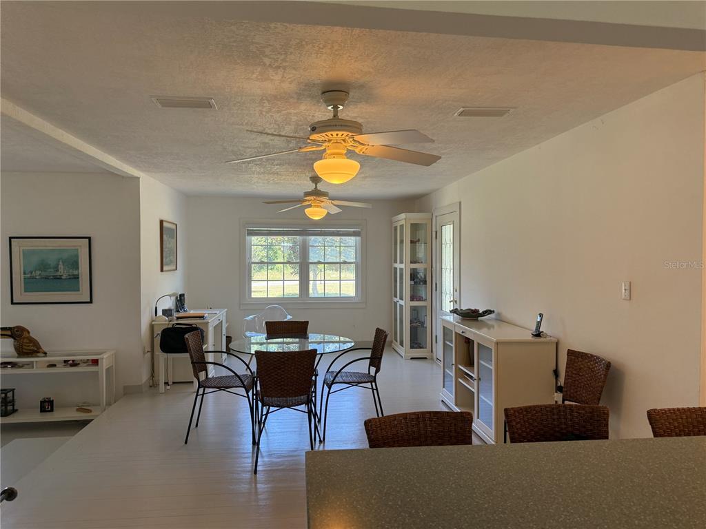 7390 South Mc Alpin Road McAlpin, FL 32062 - Photo 5 of 53 a living room with furniture and a window