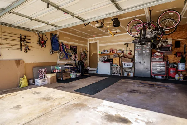 a view of a house with snow on the background