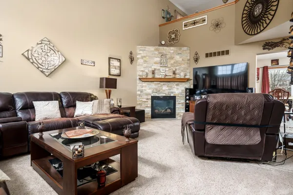 a bedroom with a bed and a table in it