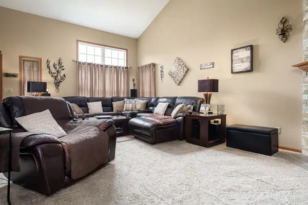 a view of a storage room with furniture and clutter