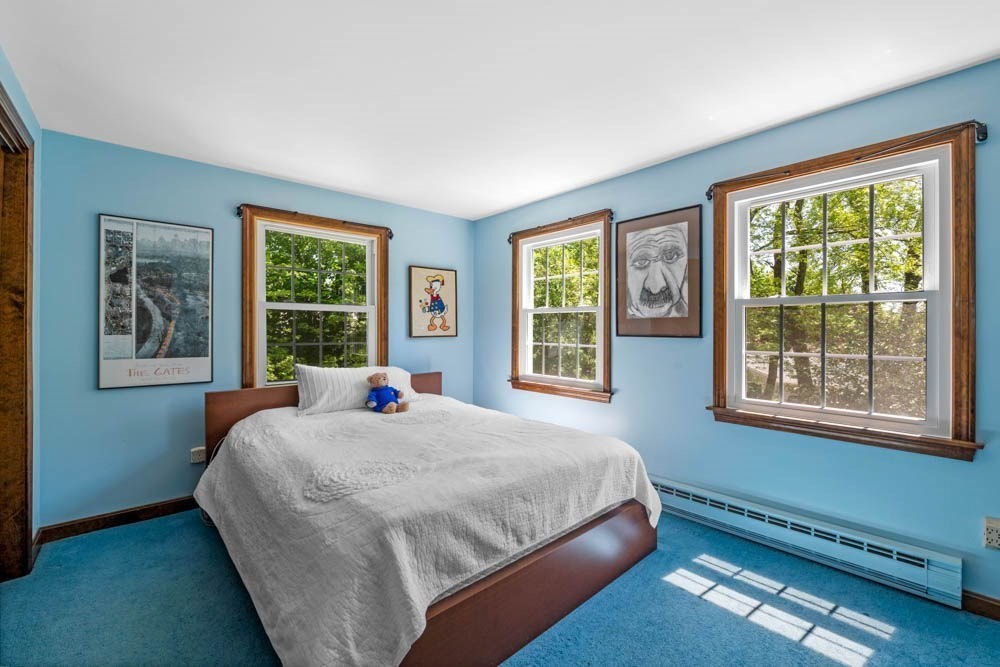 3 E Road Marblehead, MA 01945 - Photo 13 of 17 a bedroom with a bed and a window