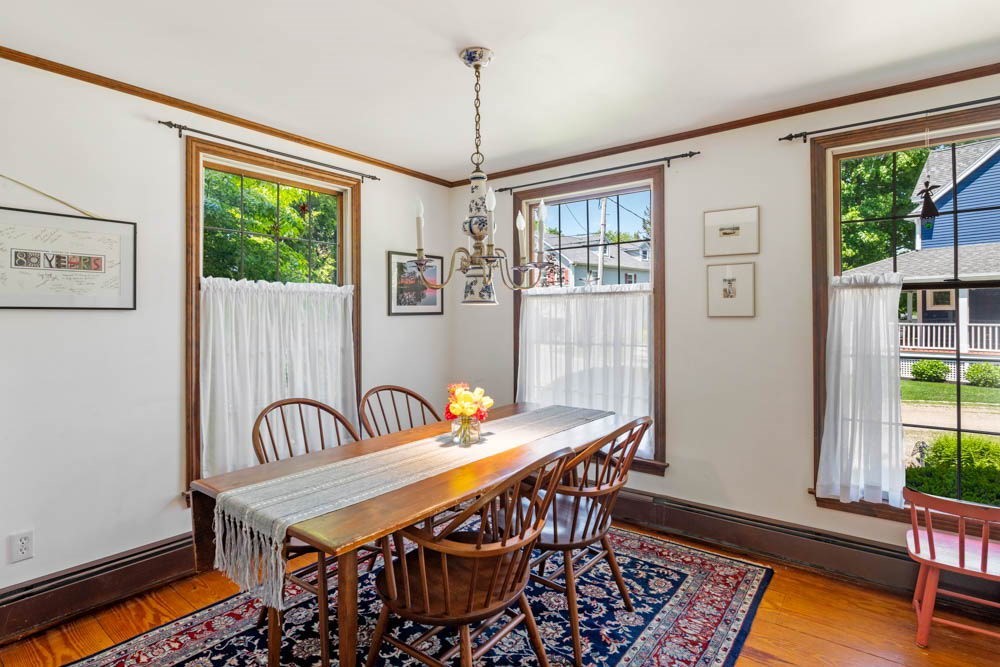 3 E Road Marblehead, MA 01945 - Photo 10 of 17 a view of a dining room with furniture window and outside view