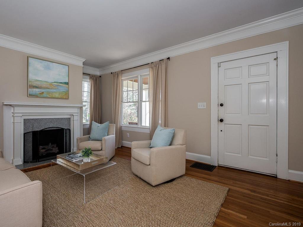 1614 Park Road Charlotte, NC 28203 - Photo 2 of 28 a living room with furniture and a fireplace