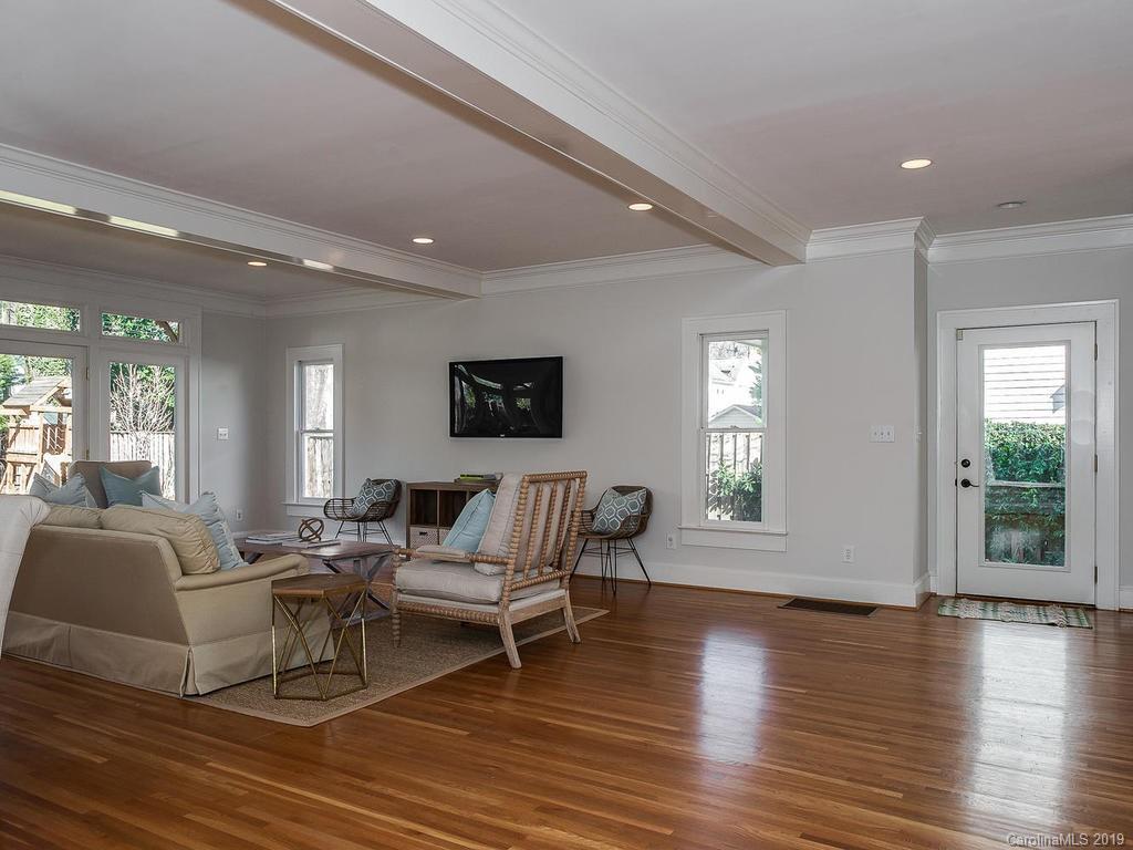 1614 Park Road Charlotte, NC 28203 - Photo 11 of 28 a living room with furniture and wooden floor