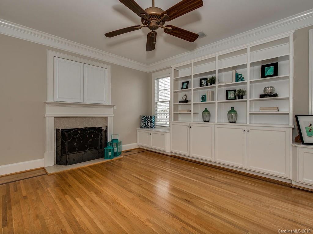 1614 Park Road Charlotte, NC 28203 - Photo 12 of 28 a view of a livingroom with a fireplace and a window