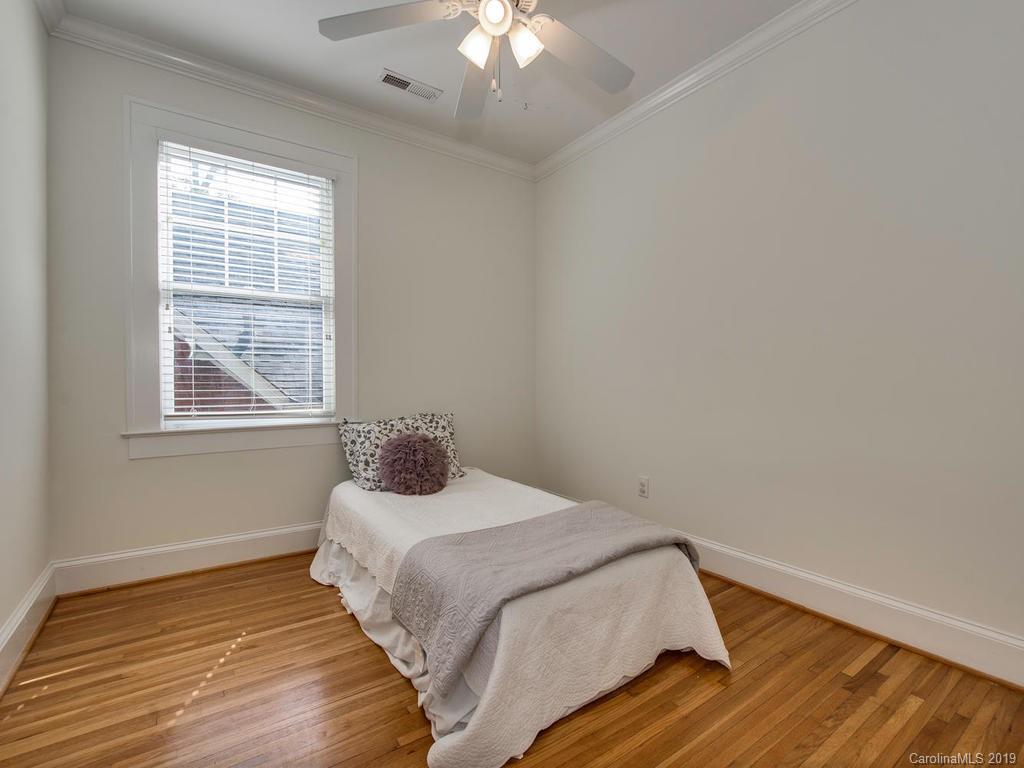 1614 Park Road Charlotte, NC 28203 - Photo 19 of 28 a bedroom with a bed and a window