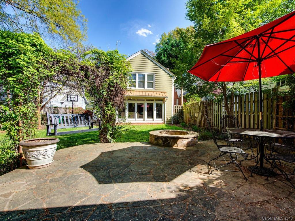 1614 Park Road Charlotte, NC 28203 - Photo 26 of 28 a view of a house with backyard and sitting area