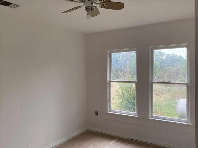 an empty room with a window