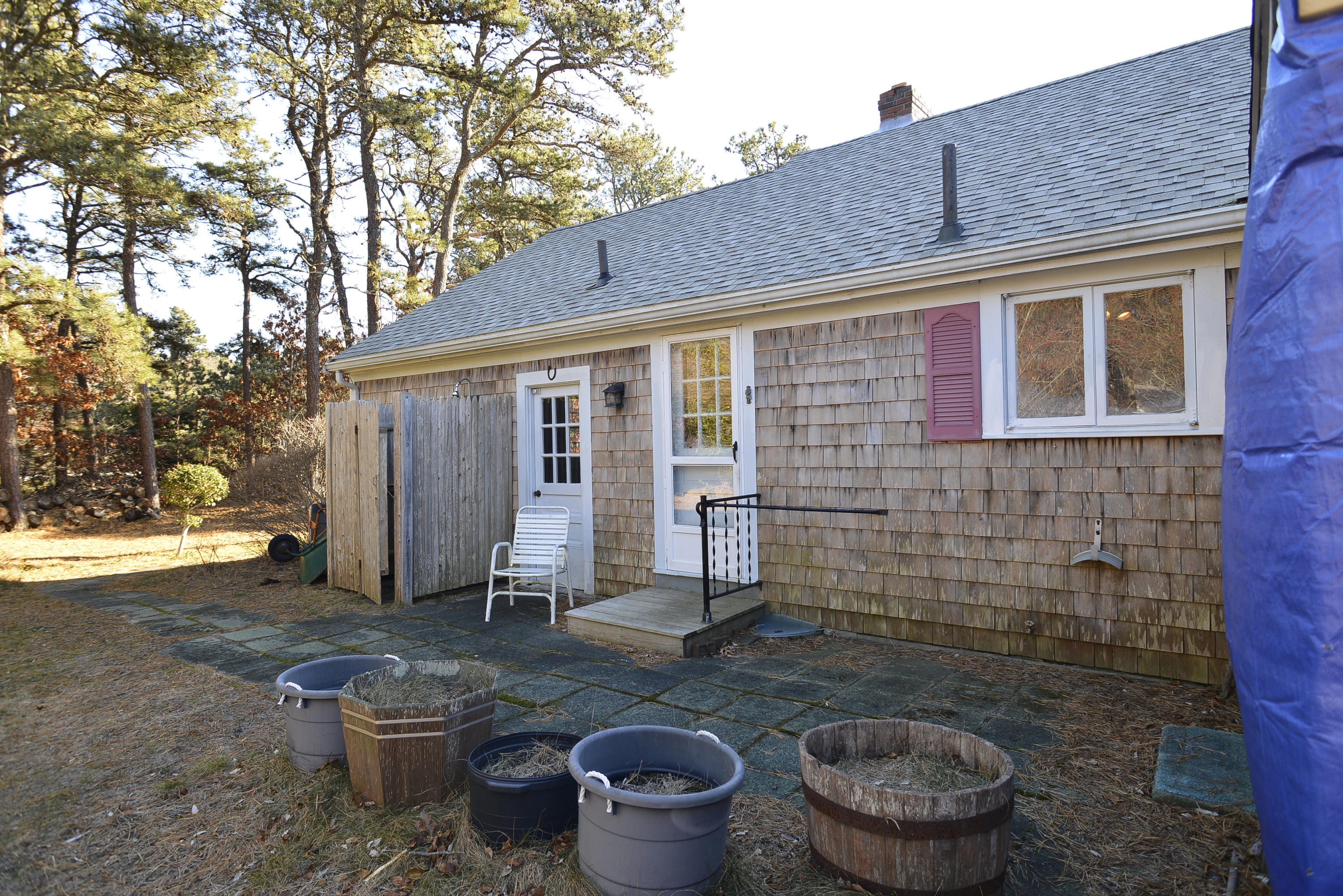 6 Captain Nickerson Road South Yarmouth, MA 02664 - Photo 20 of 20 a backyard of house with outdoor seating