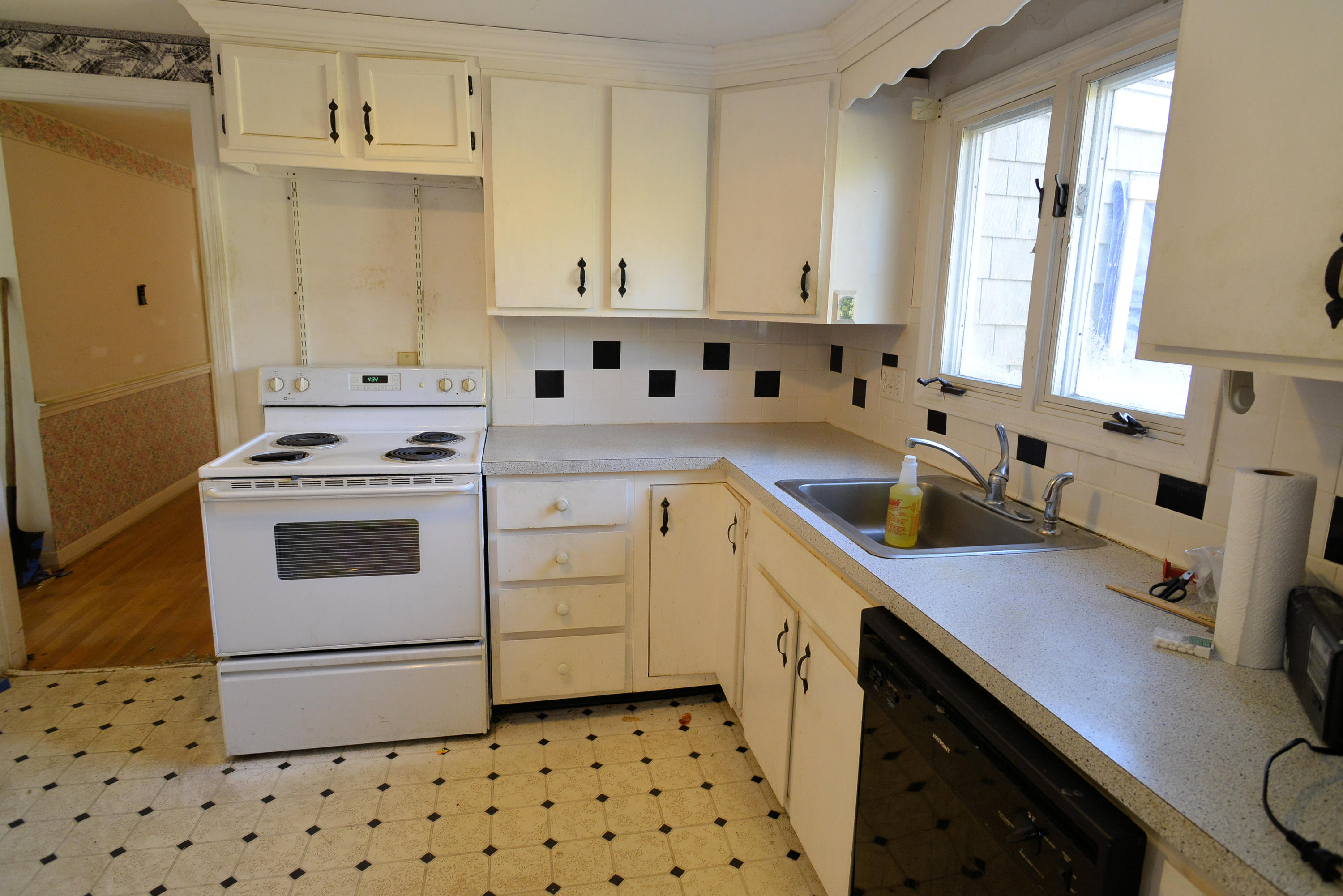 6 Captain Nickerson Road South Yarmouth, MA 02664 - Photo 4 of 20 a kitchen with granite countertop white cabinets and white appliances