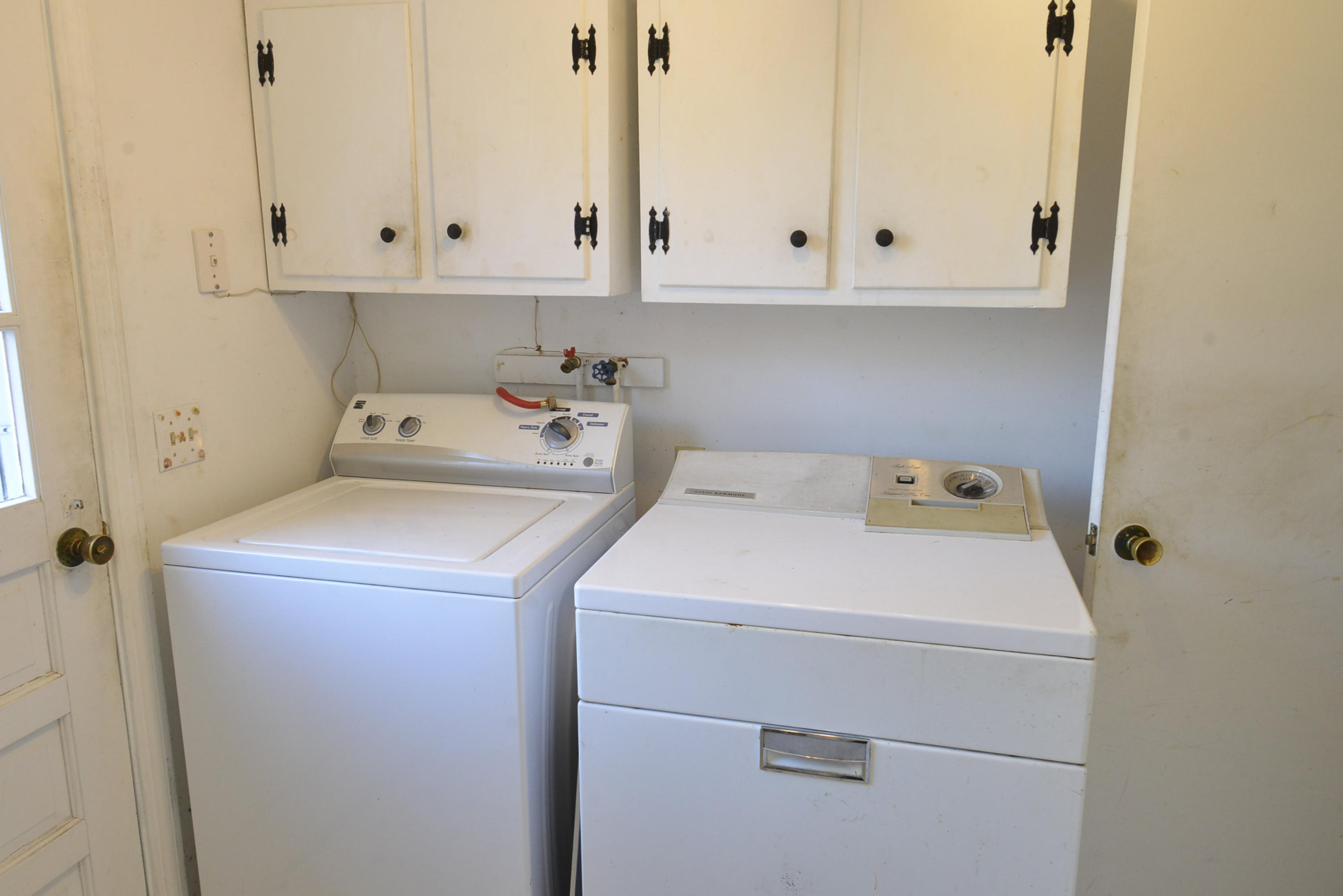 6 Captain Nickerson Road South Yarmouth, MA 02664 - Photo 5 of 20 a view of utility room with washer and dryer