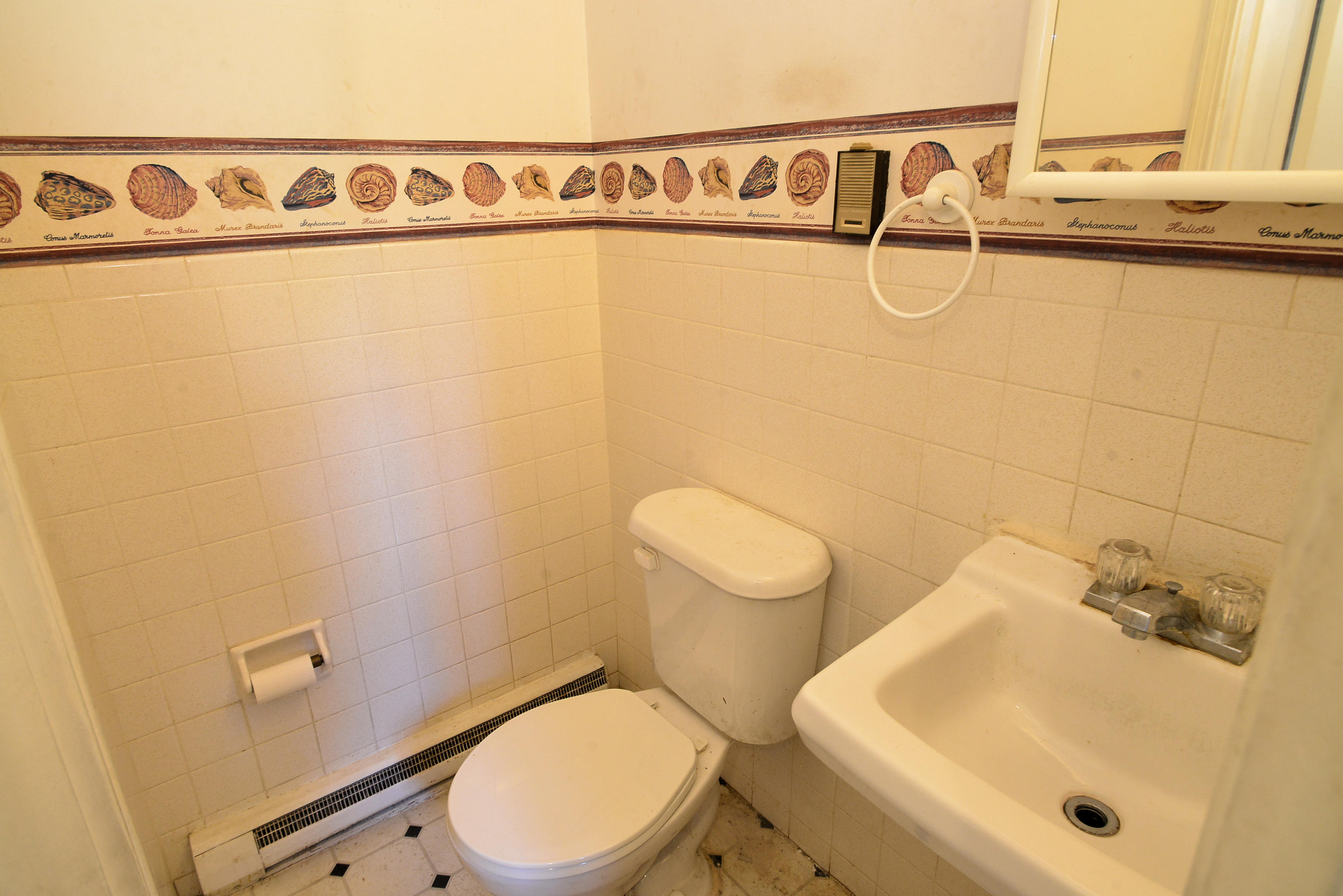 6 Captain Nickerson Road South Yarmouth, MA 02664 - Photo 9 of 20 a bathroom with a toilet and a sink