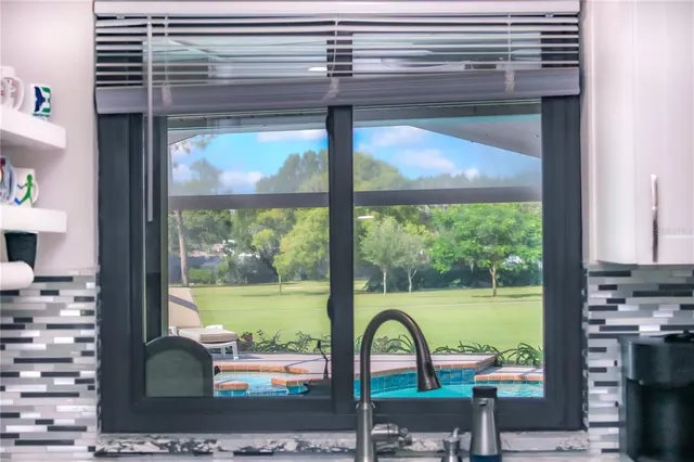 a view of a floor to ceiling window and a floor to ceiling window