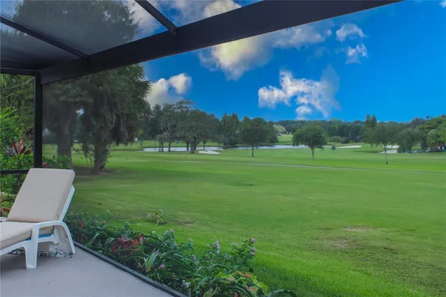 a view of a golf course with a table