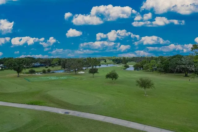 a view of a house with a big yard