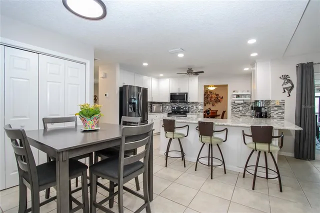 a view of a dining room with furniture