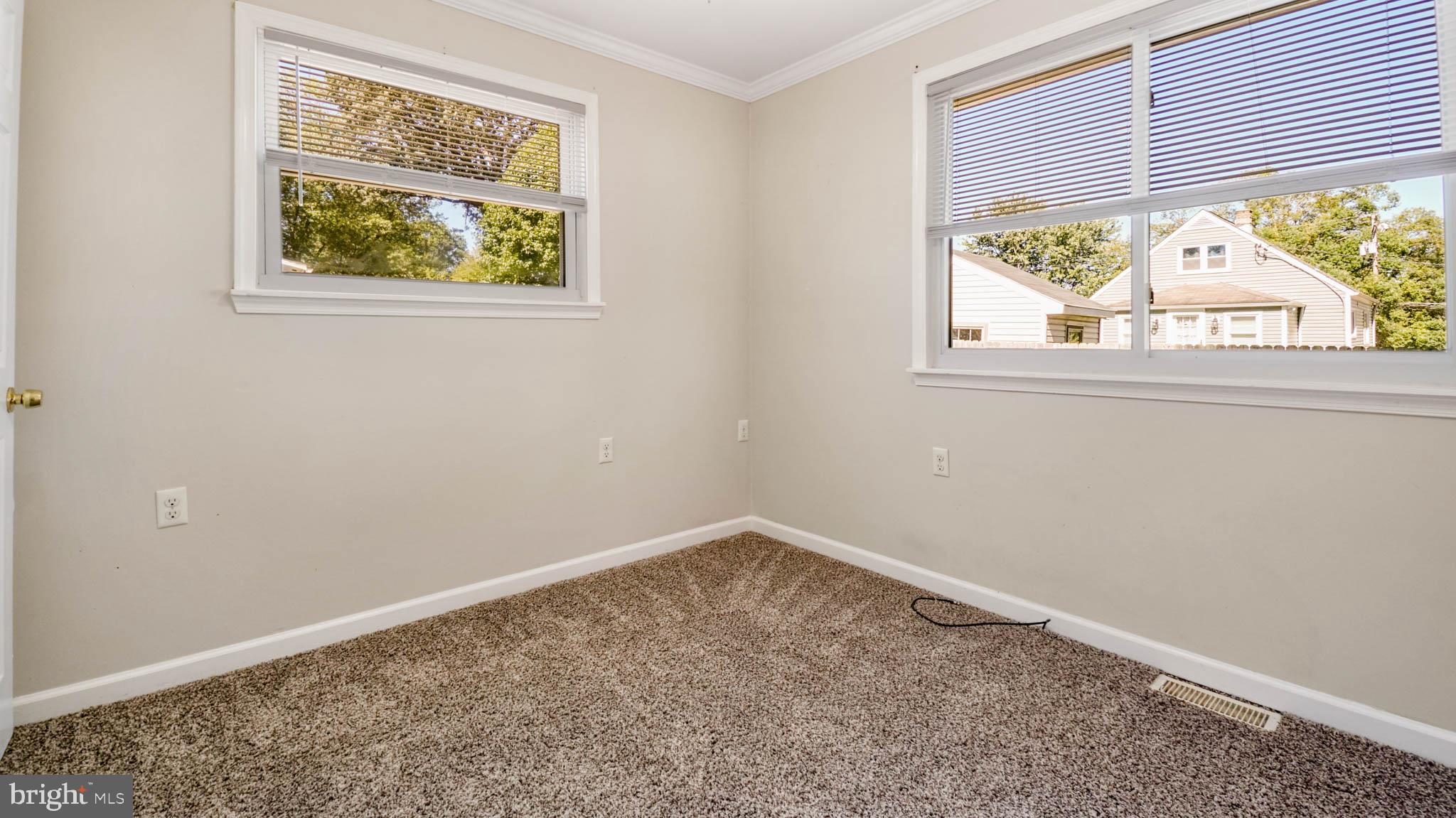 917 Oakleigh Beach Road Baltimore, MD 21222 - Photo 14 of 27 Bedroom #3 with natural light