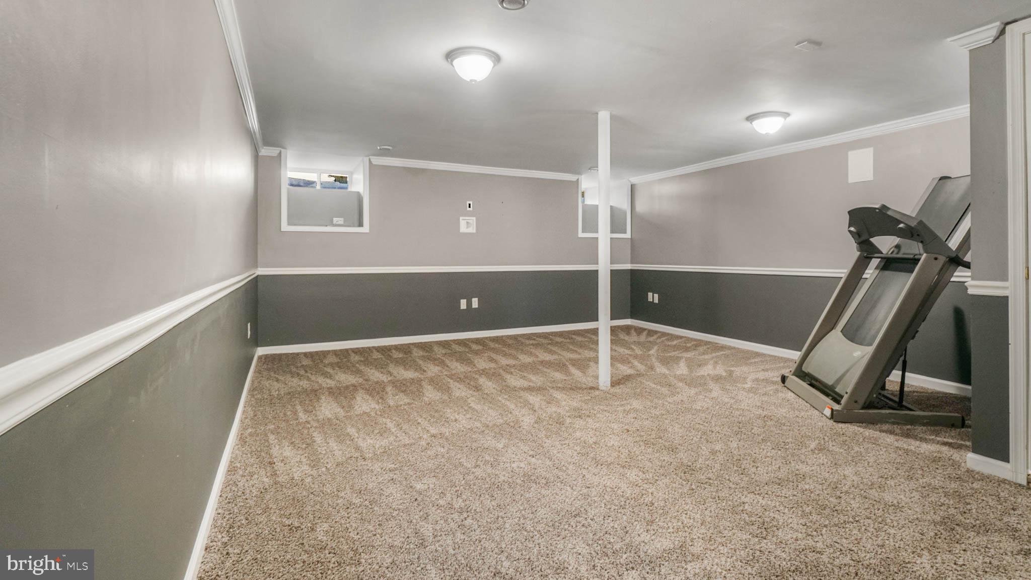 917 Oakleigh Beach Road Baltimore, MD 21222 - Photo 16 of 27 Fully finished basement with new carpet