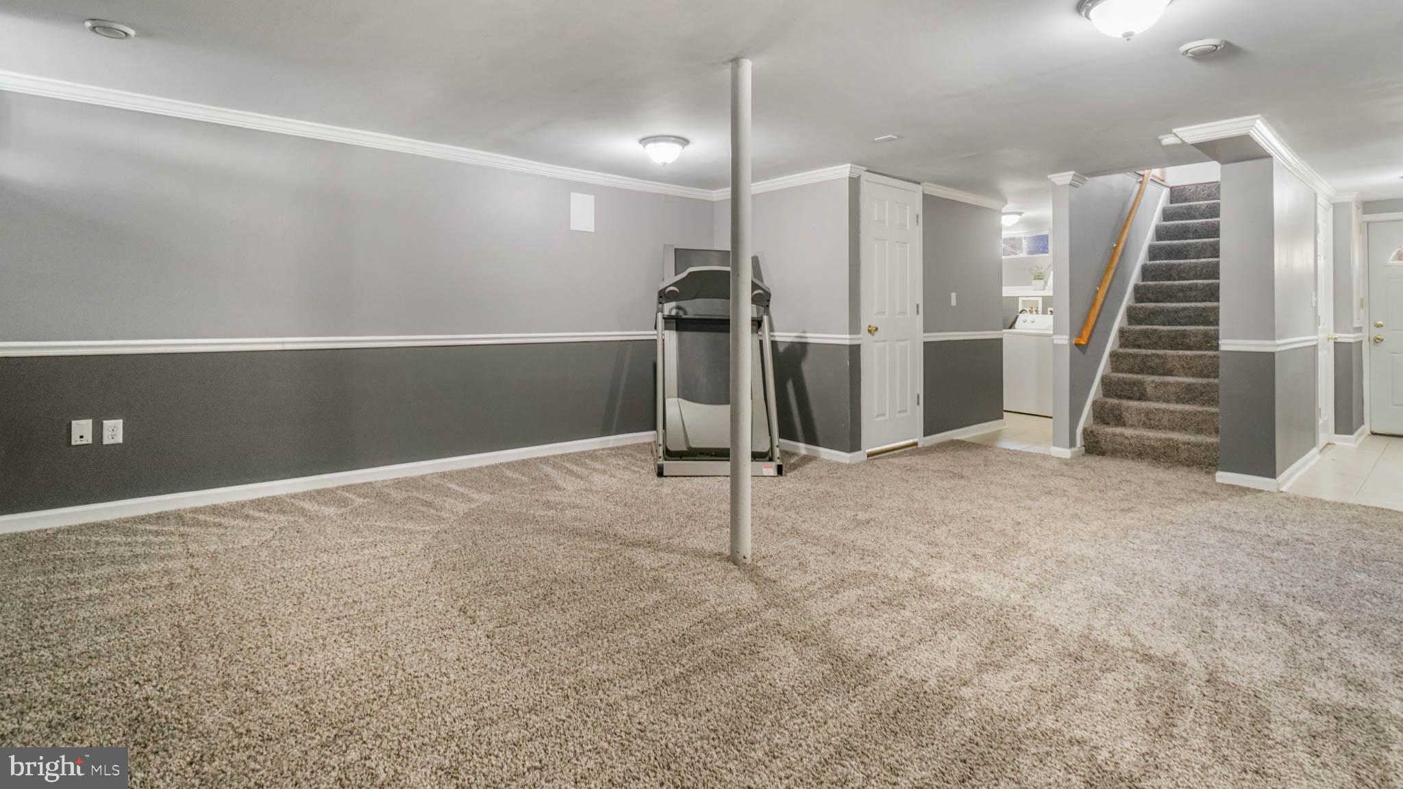 917 Oakleigh Beach Road Baltimore, MD 21222 - Photo 17 of 27 Finished basement with walkup exit to outside