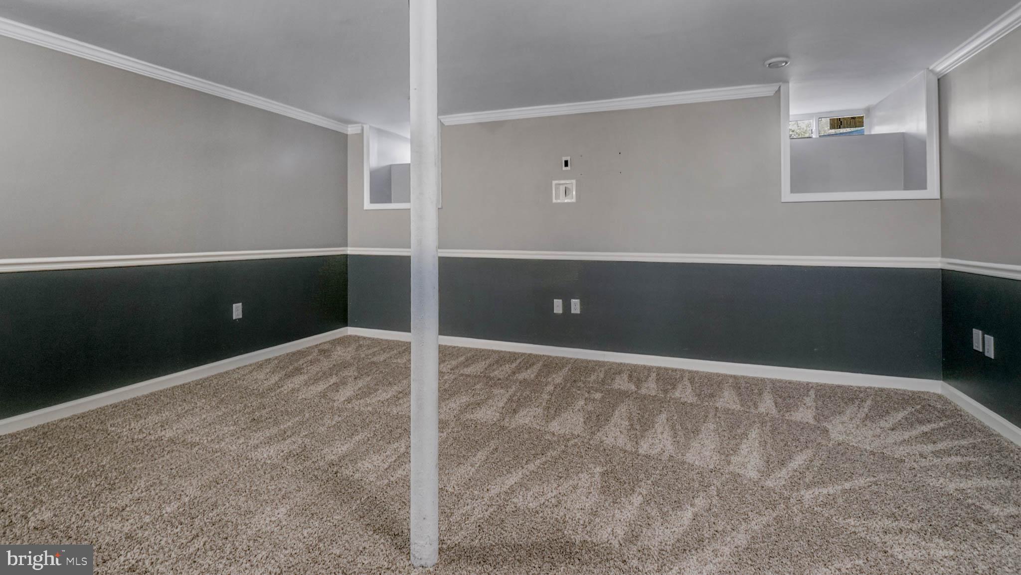 917 Oakleigh Beach Road Baltimore, MD 21222 - Photo 18 of 27 Finished basement