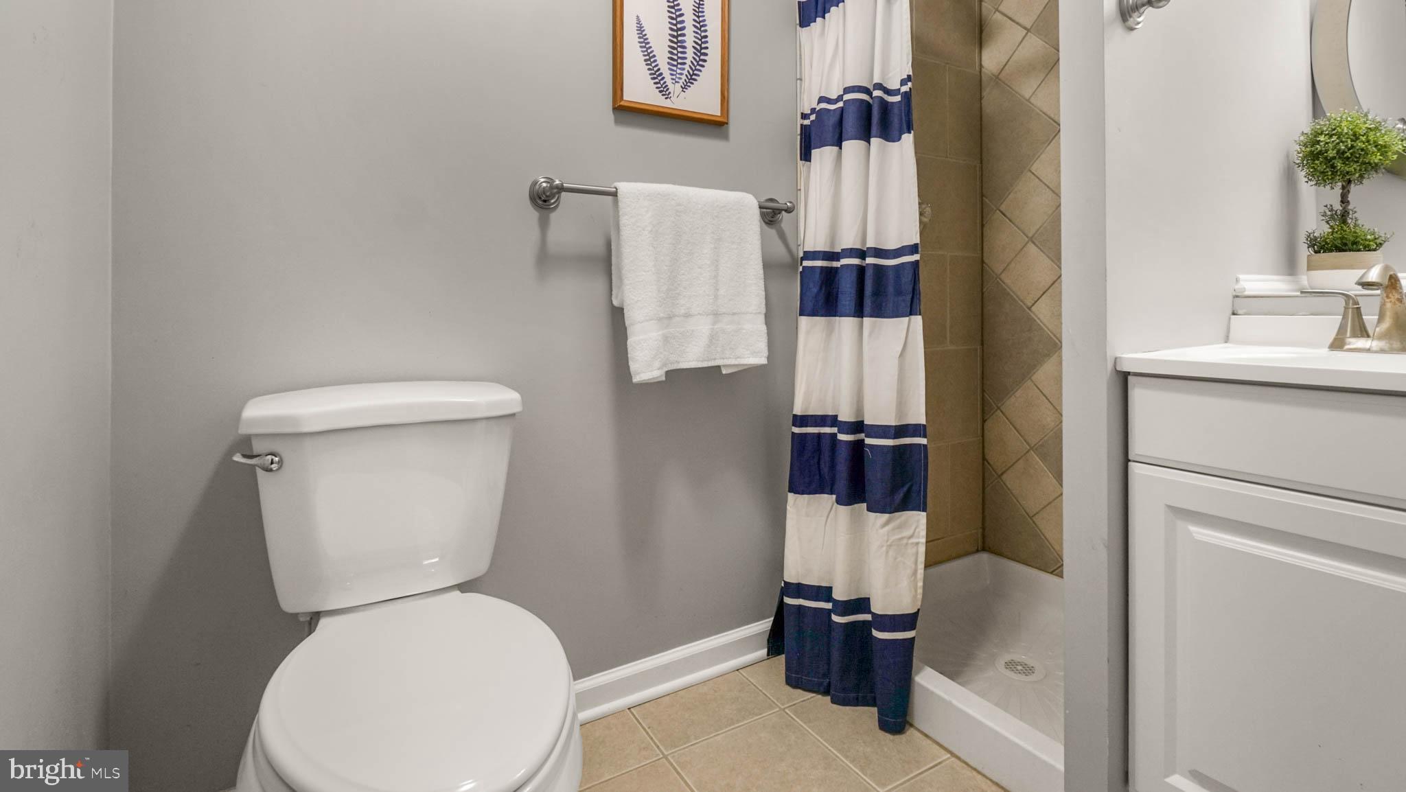 917 Oakleigh Beach Road Baltimore, MD 21222 - Photo 21 of 27 Basement full bathroom with shower