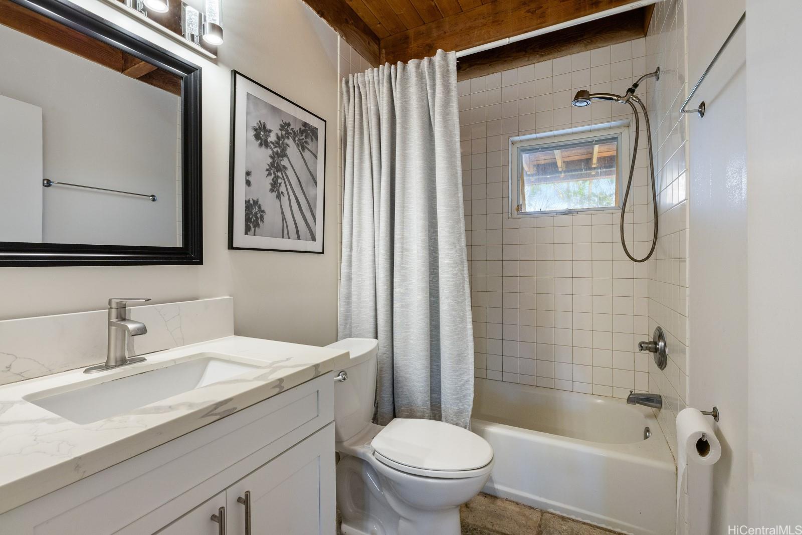8 Prospect Street Honolulu, HI 96813 - Photo 18 of 25 a bathroom with a sink toilet and shower