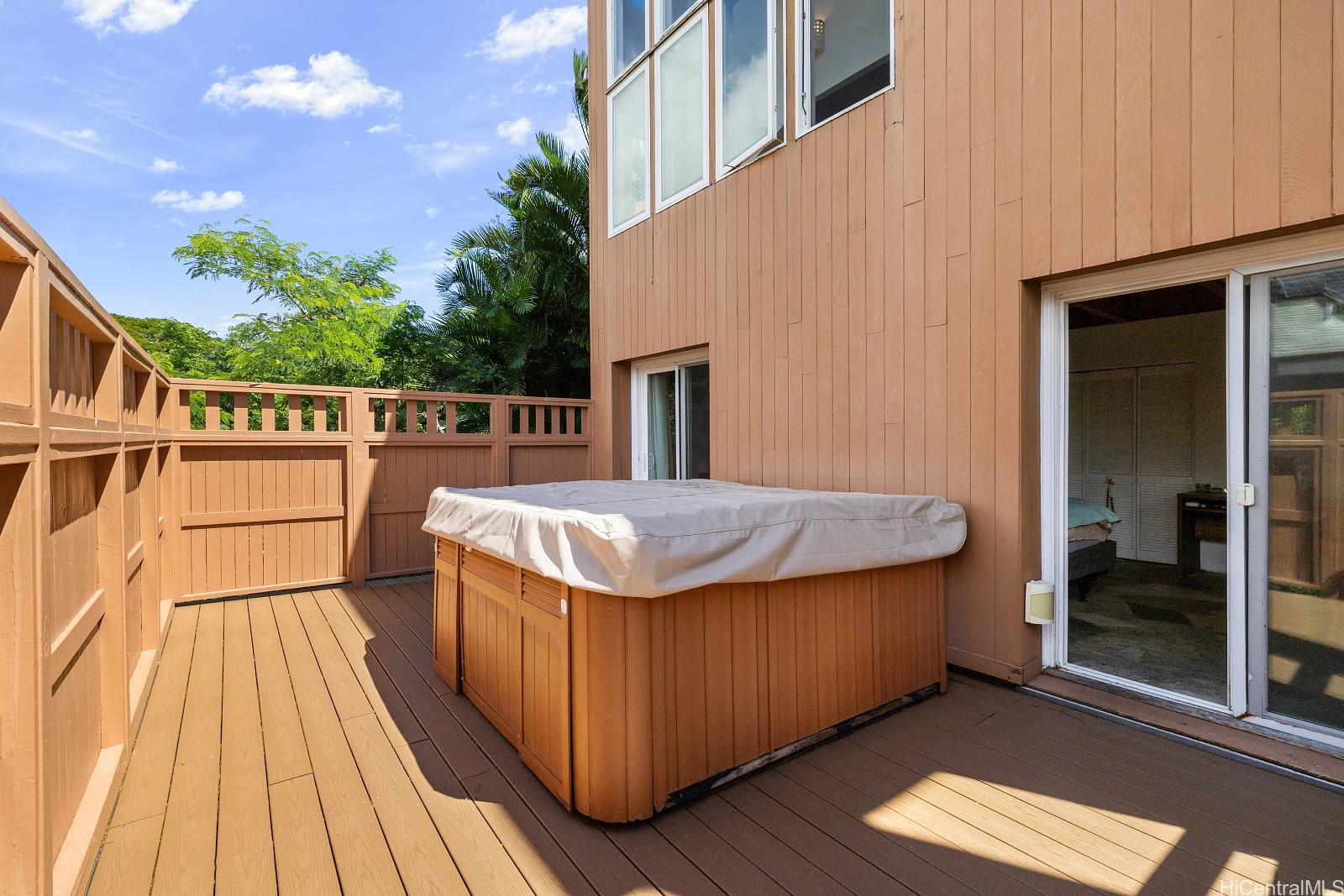 8 Prospect Street Honolulu, HI 96813 - Photo 19 of 25 a view of a balcony with wooden floor and fence