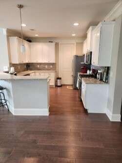 194 Yorkshire Lane Villa Rica, GA 30180 - Photo 5 of 20 a kitchen with stainless steel appliances a stove top oven a sink a refrigerator and cabinets