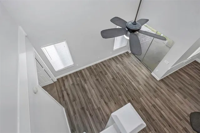 a view of a hallway with a chandelier