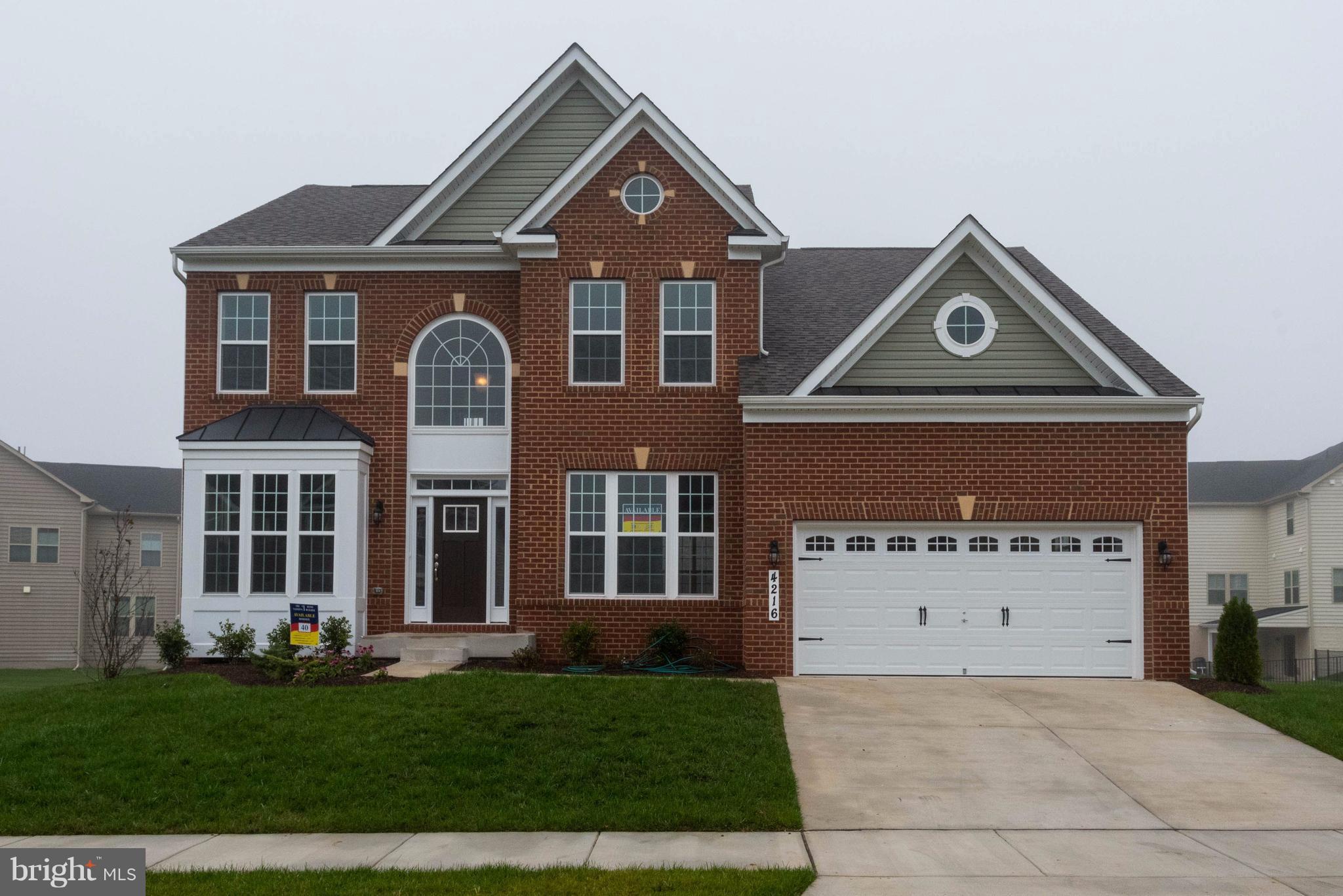9766 Powder Hall Road Perry Hall, MD 21128 - Photo 1 of 30 front view of a house with a yard