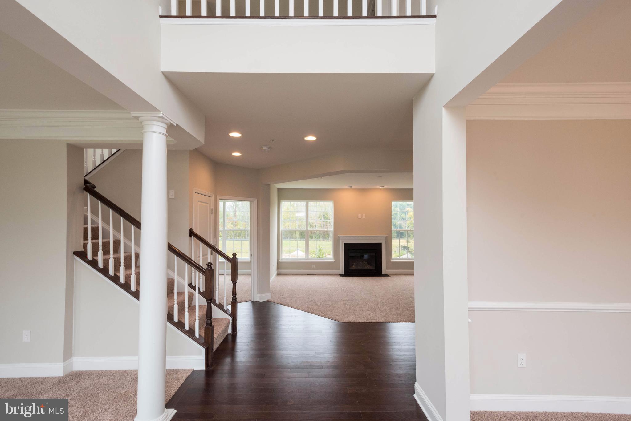 9766 Powder Hall Road Perry Hall, MD 21128 - Photo 2 of 30 a view of entryway and hall with wooden floor