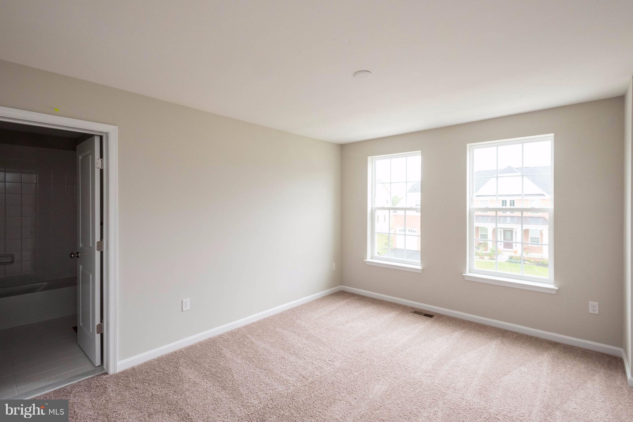 9766 Powder Hall Road Perry Hall, MD 21128 - Photo 21 of 30 an empty room with windows