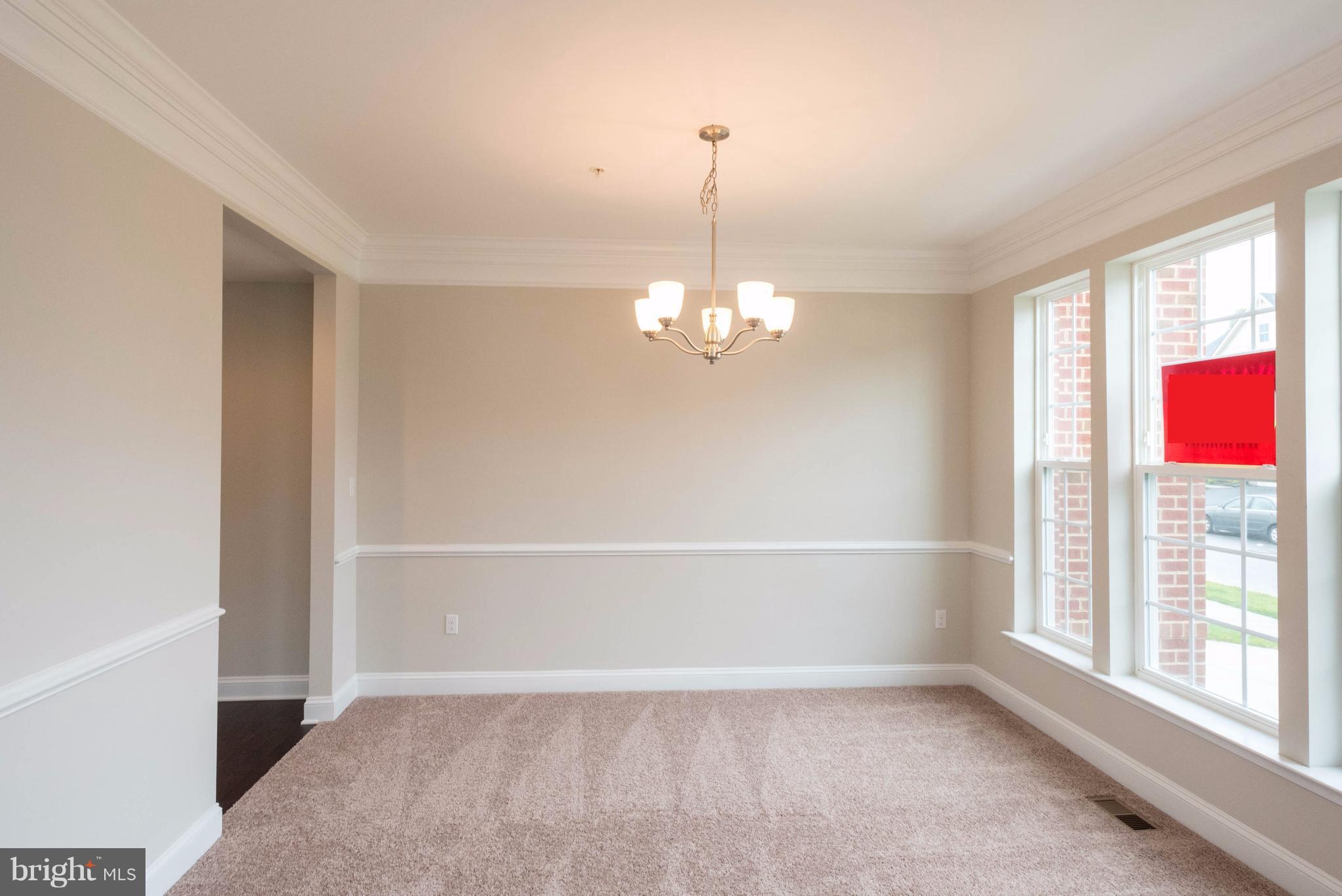 9766 Powder Hall Road Perry Hall, MD 21128 - Photo 4 of 30 a view of an empty room with a window