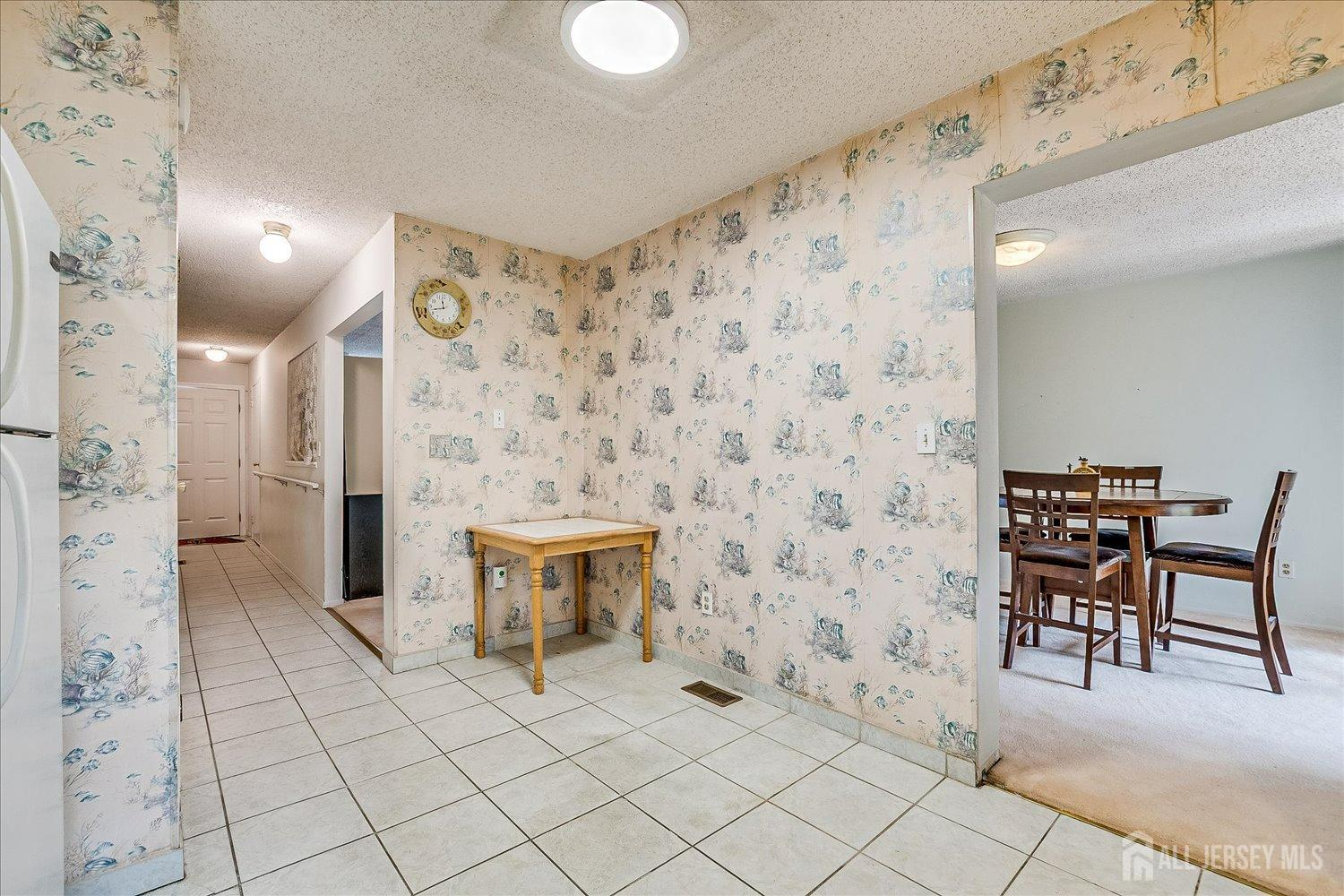 4702 Hana Road Edison, NJ 08817 - Photo 14 of 28 a spacious bathroom with a shower and a sink