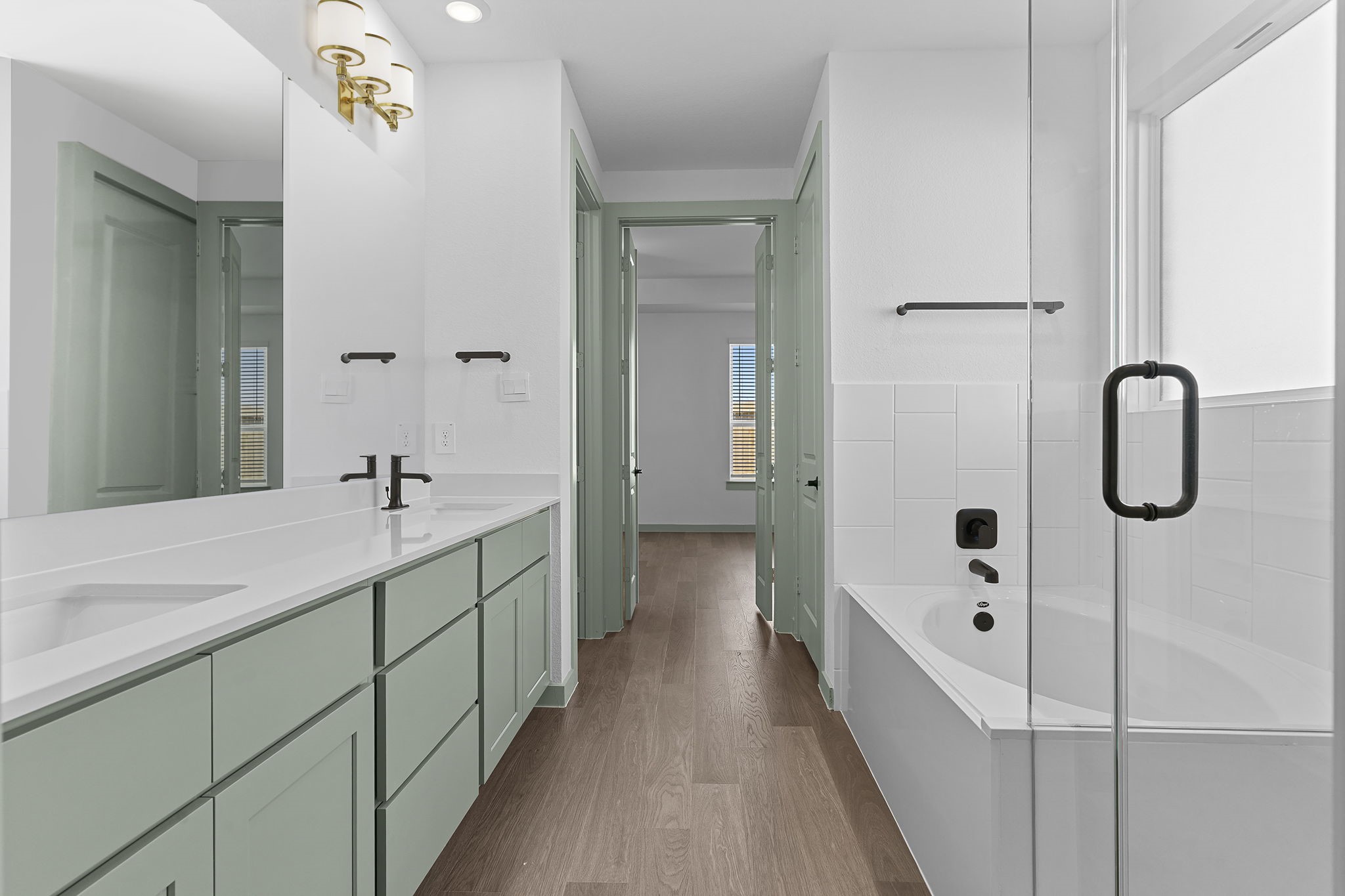 3305 Bolt Rope Drive Texas City, TX 77568 - Photo 11 of 30 a bathroom with a double vanity sink a toilet and shower