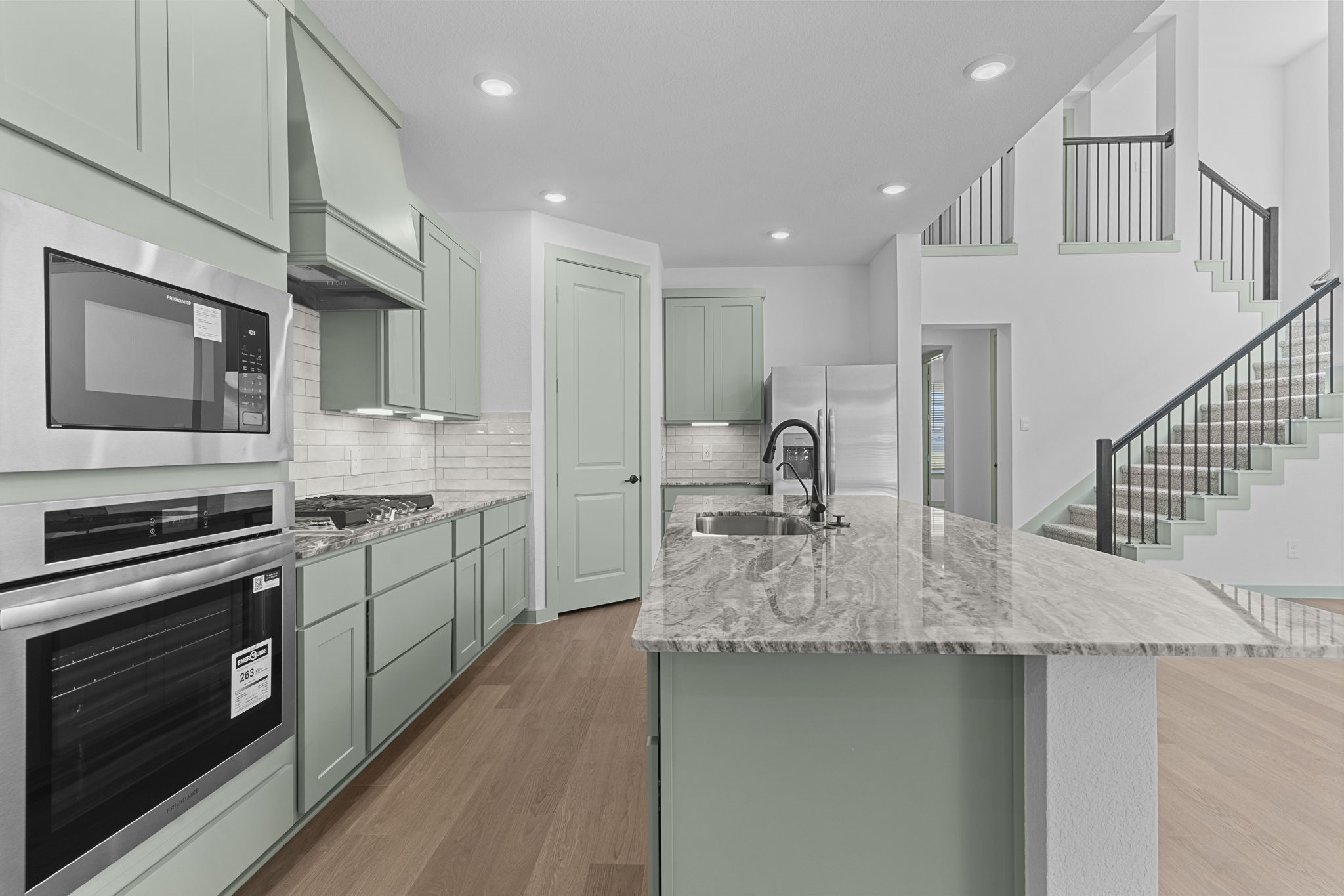 3305 Bolt Rope Drive Texas City, TX 77568 - Photo 4 of 30 a kitchen with stainless steel appliances granite countertop a sink stove and refrigerator