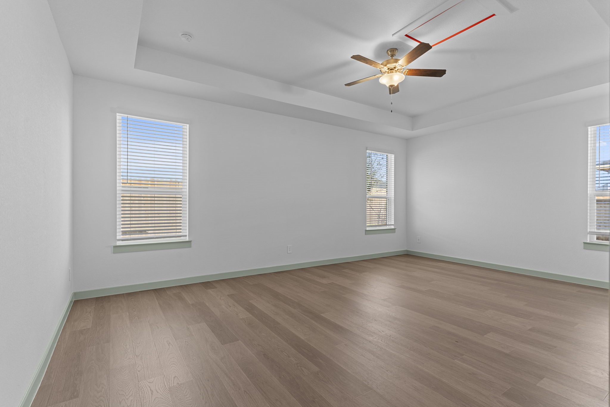 3305 Bolt Rope Drive Texas City, TX 77568 - Photo 9 of 30 a view of an empty room with wooden floor and a window