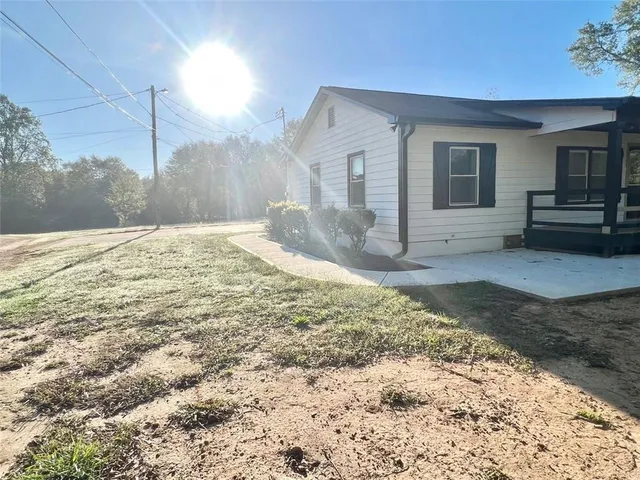 a view of a backyard of a house