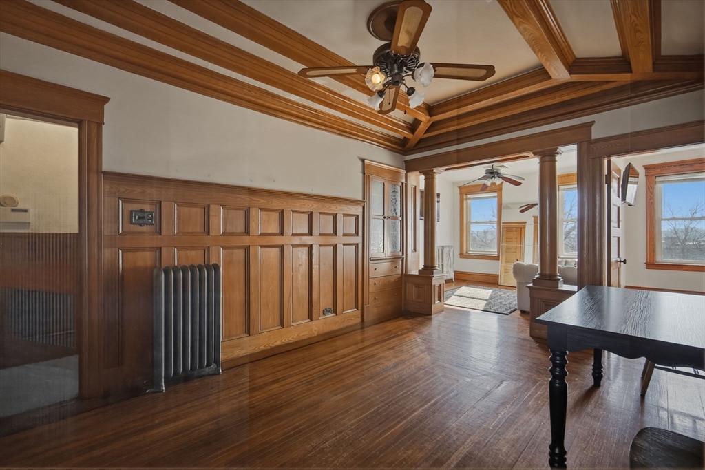 99-101 High Street Holyoke, MA 01040 - Photo 12 of 27 a view of a livingroom with furniture and hardwood floor