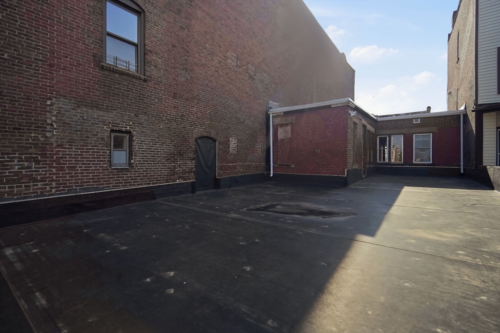 99-101 High Street Holyoke, MA 01040 - Photo 19 of 27 a view of a house with a backyard