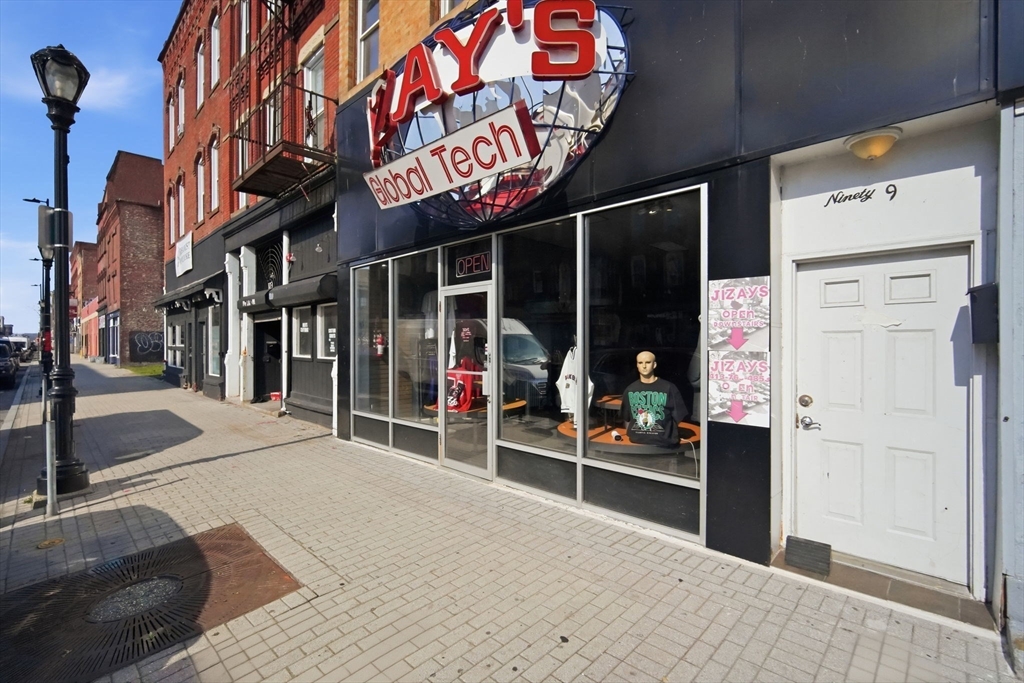 99-101 High Street Holyoke, MA 01040 - Photo 25 of 27 a view of a street with stores