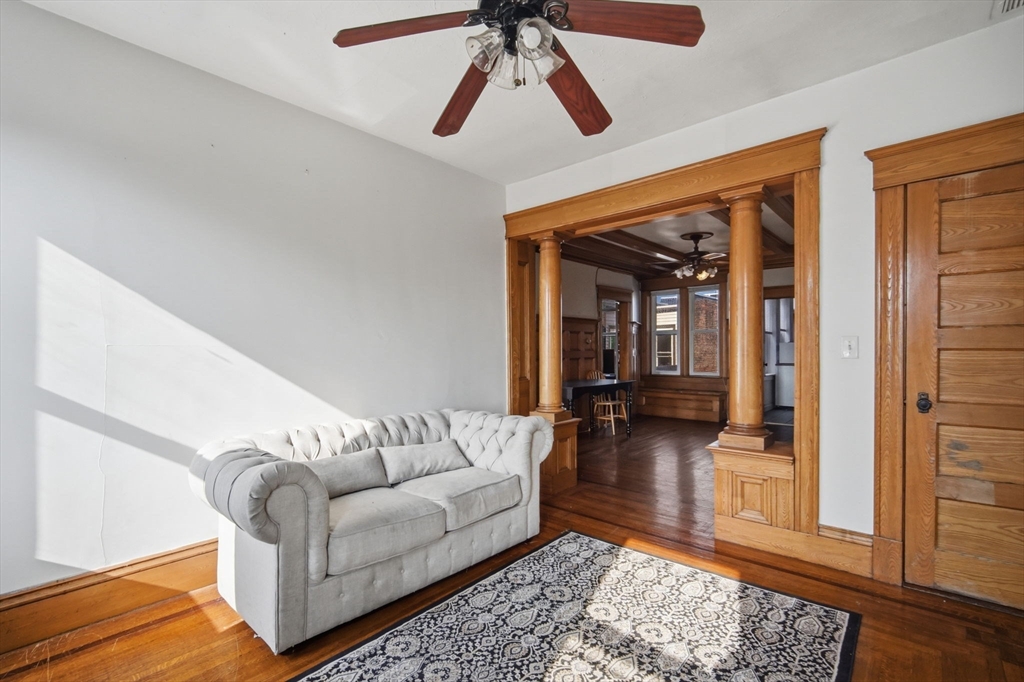 99-101 High Street Holyoke, MA 01040 - Photo 9 of 27 a living room with furniture and a rug