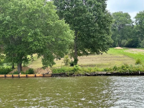 a view of a ocean with a house