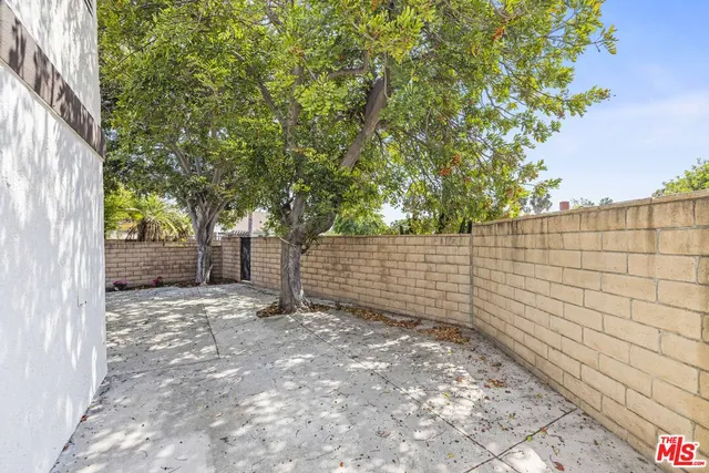 a view of a house with a yard and garage