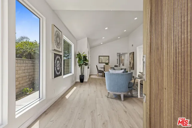 a view of a living room and a window