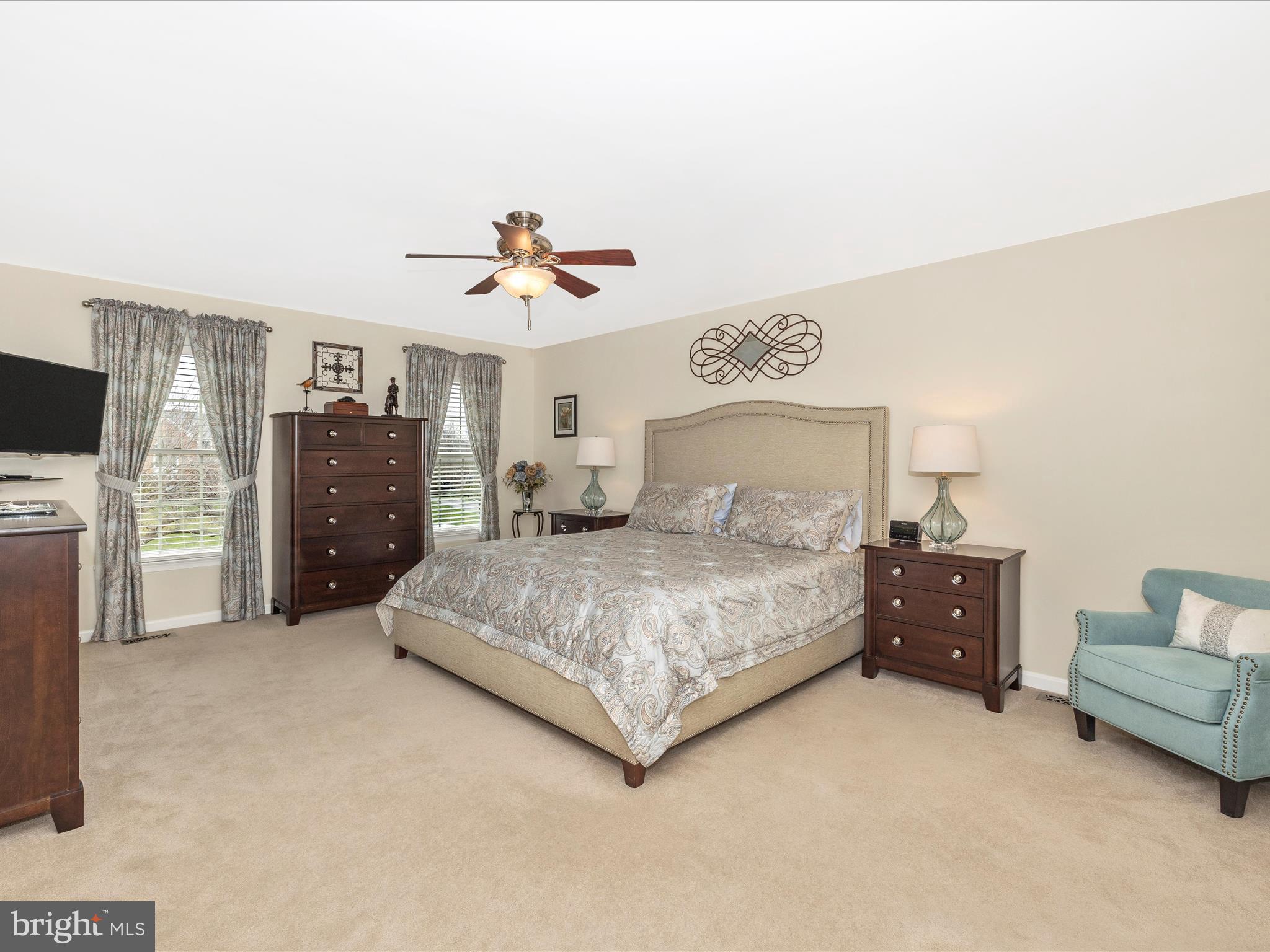 4945 Jalmia Road Mount Airy, MD 21771 - Photo 16 of 45 a bedroom with a bed and a television
