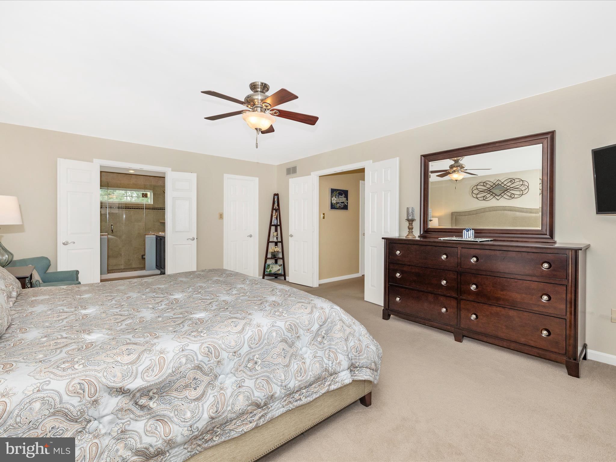 4945 Jalmia Road Mount Airy, MD 21771 - Photo 18 of 45 a bedroom with a bed and a dresser